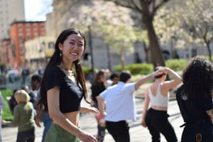 Dancers in background